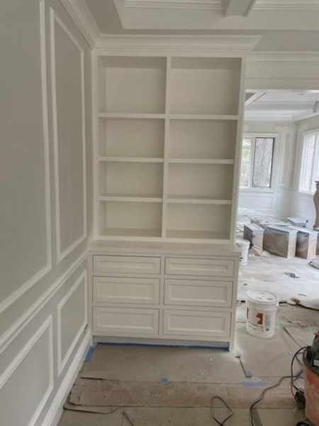 Built-in shelving painted crisp white