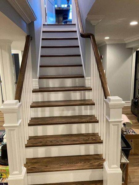 Staircase with painted risers, stringers and balusters